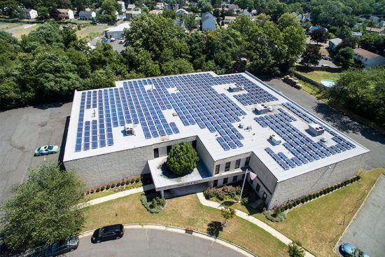 Commercial Solar panels on top of building